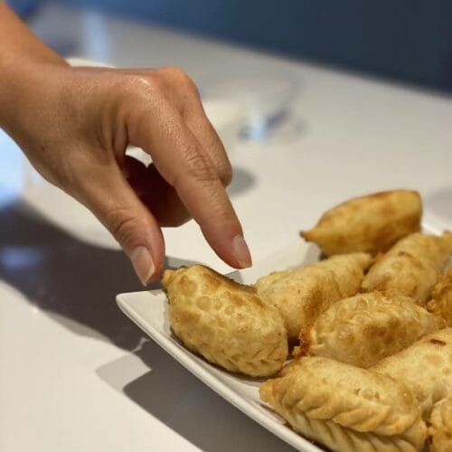 fried culurgiones during a cooking class in Sardinia.